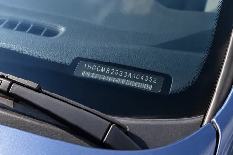 Vehicle dashboard showing a 17-character vehicle identification number